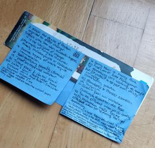 A bookmark with post-it notes